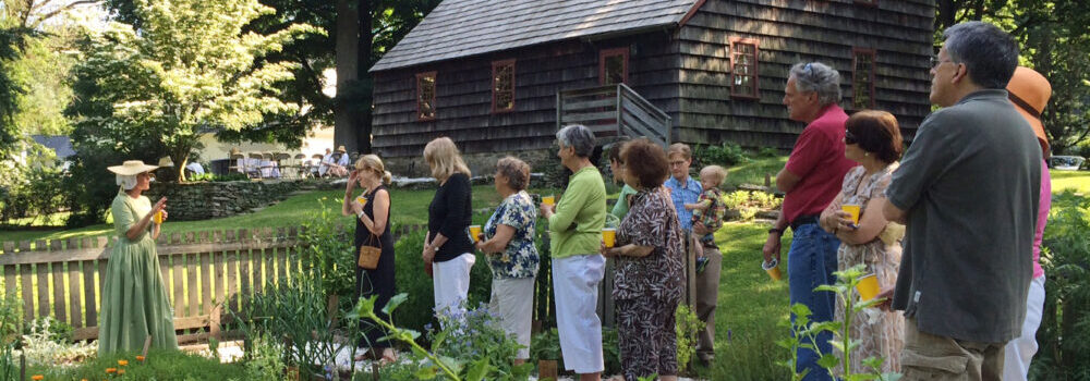 Ogden Whitney in Garden at the Fairfield Museum